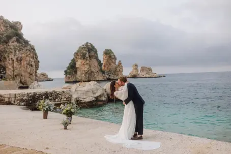 happy bride and groom at their beach wedding