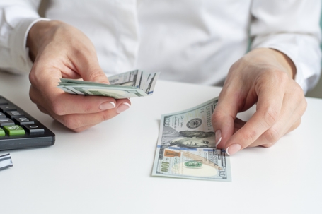 woman counting money